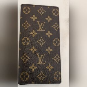 LV  Wallet/Passport Cover In Excellent Preloved Condition.